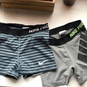 2 pairs of Nike pro spandex